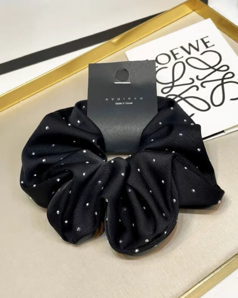 Chouchou à cheveux avec des paillettes scintillantes