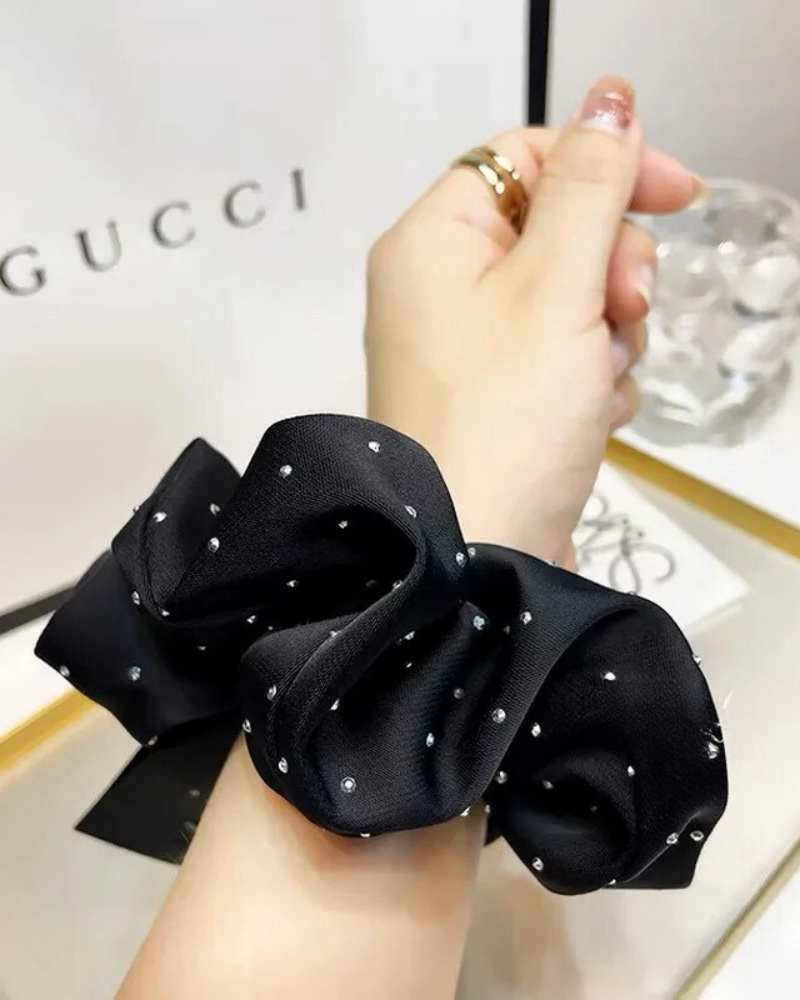 Chouchou à cheveux avec des paillettes scintillantes