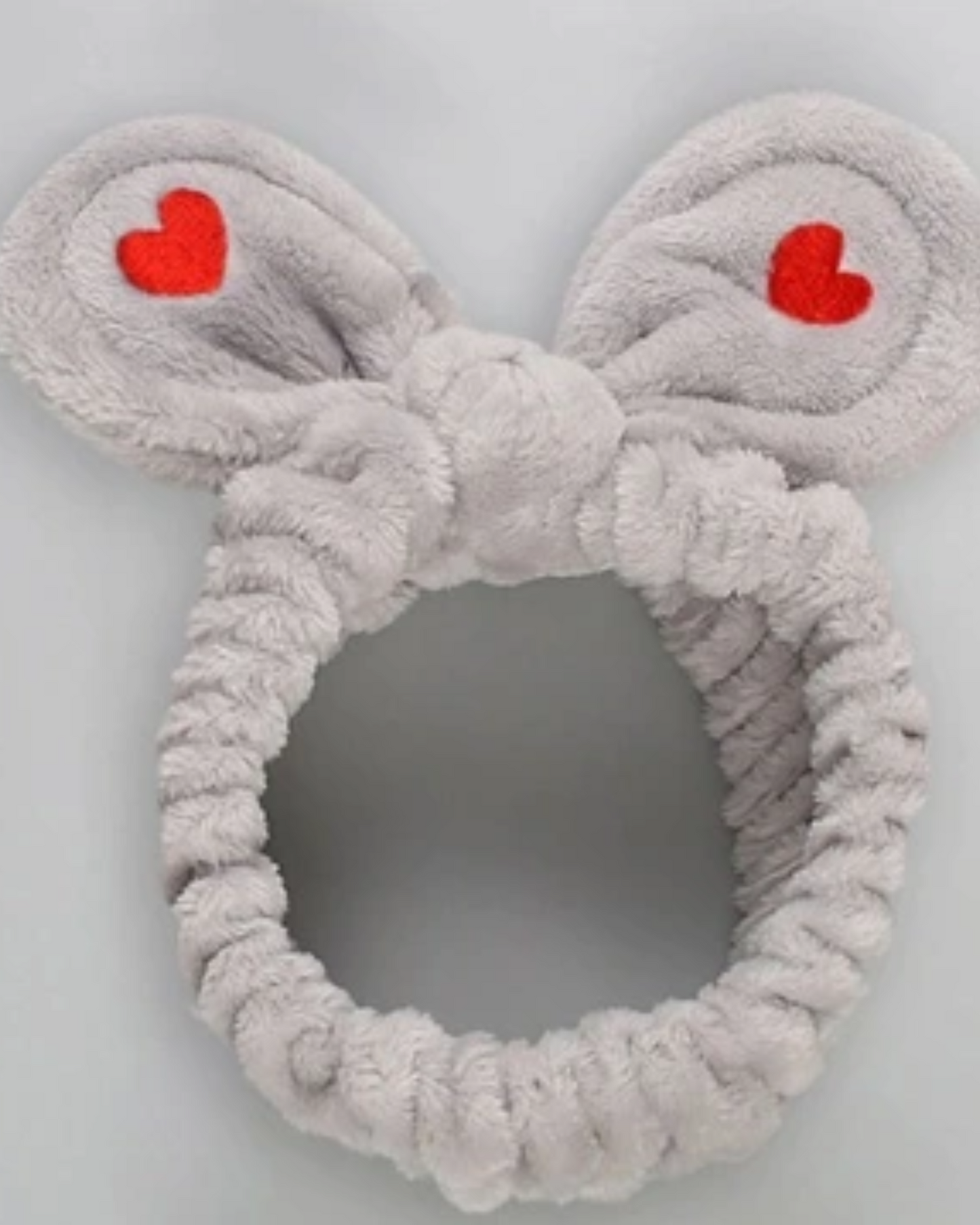 Bandeau en peluche avec des cœurs
