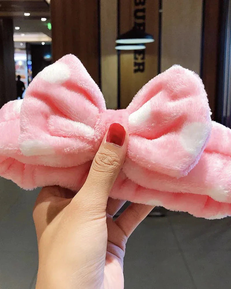 Bandeau en peluche avec un nœud à pois