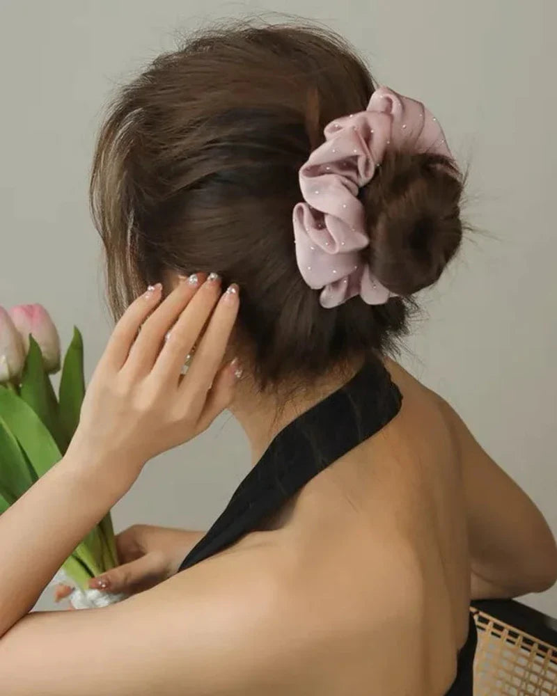 Chouchou à cheveux avec des paillettes scintillantes