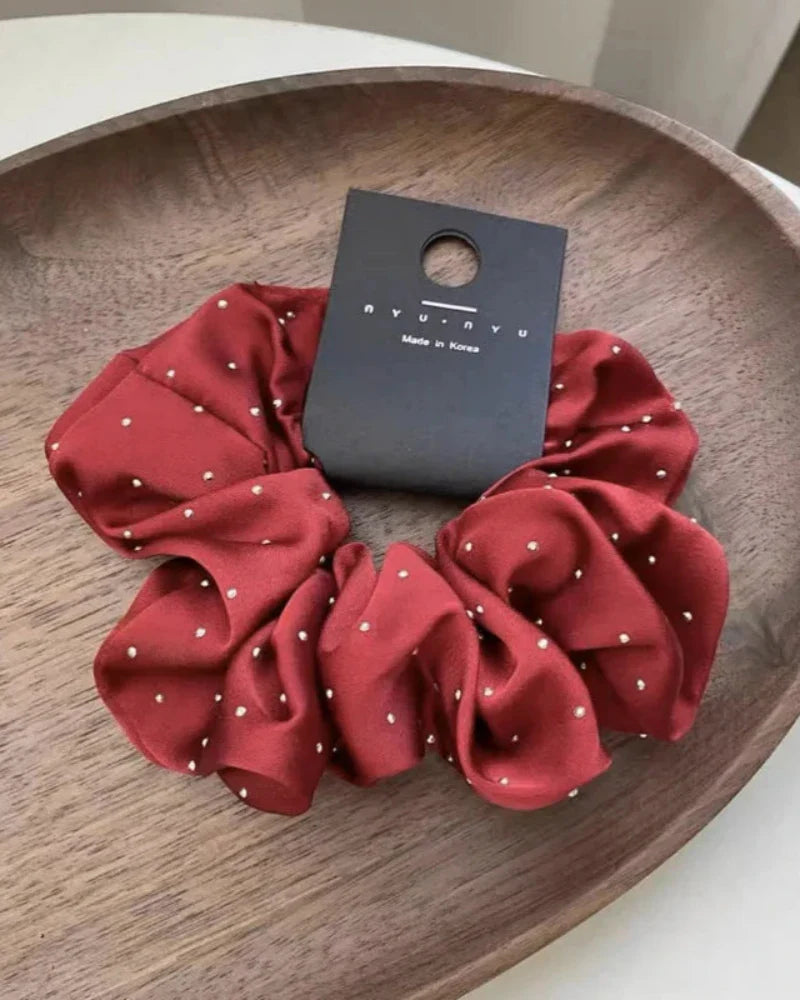 Chouchou à cheveux avec des paillettes scintillantes