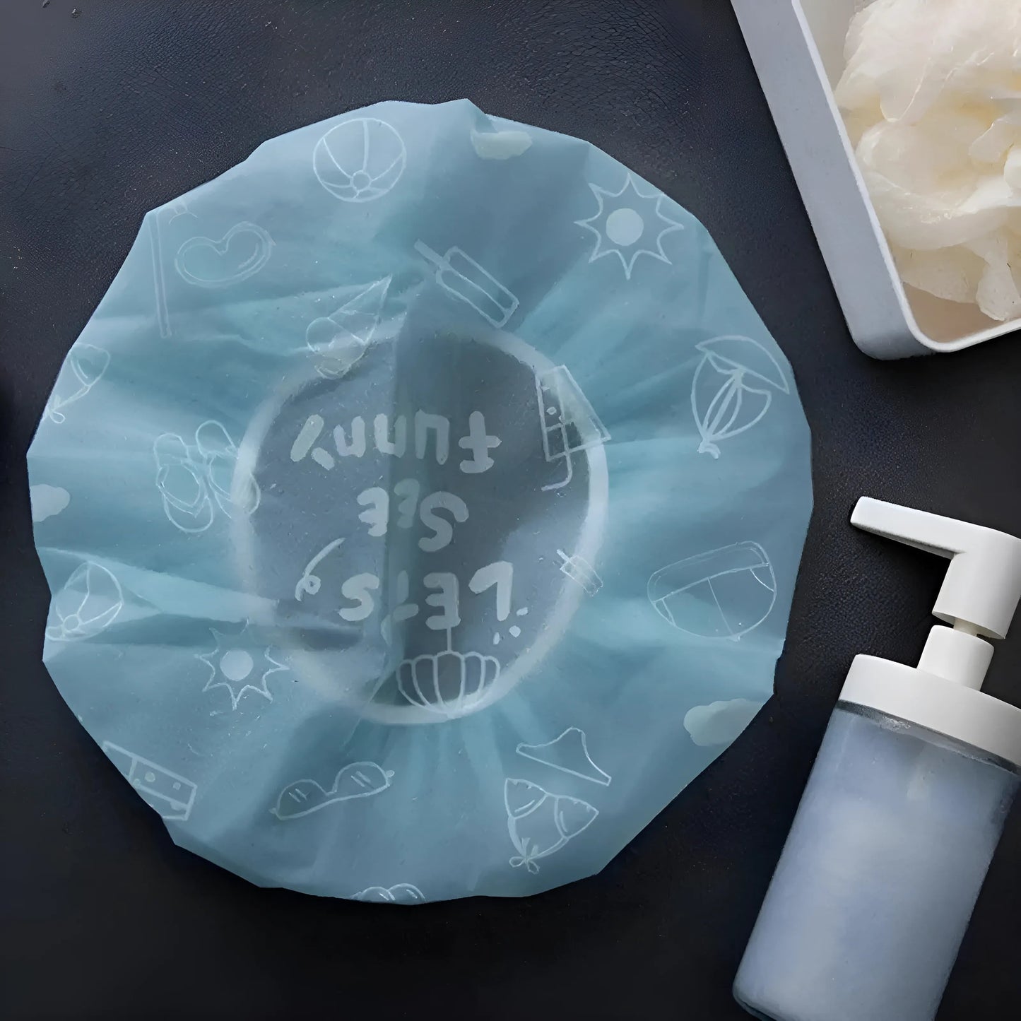 Bonnet de douche avec élastique