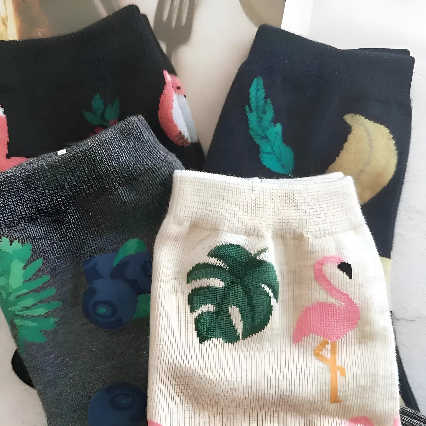 Chaussettes longues avec des imprimés colorés