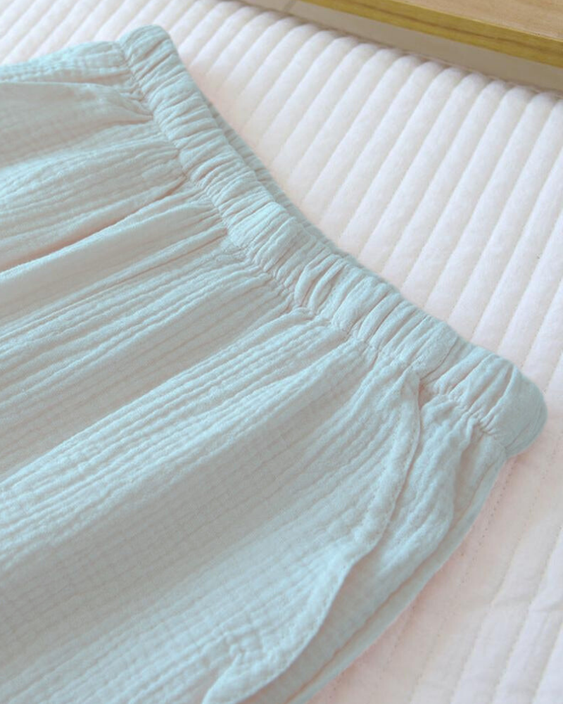 Pantalons longs en mousseline avec volants