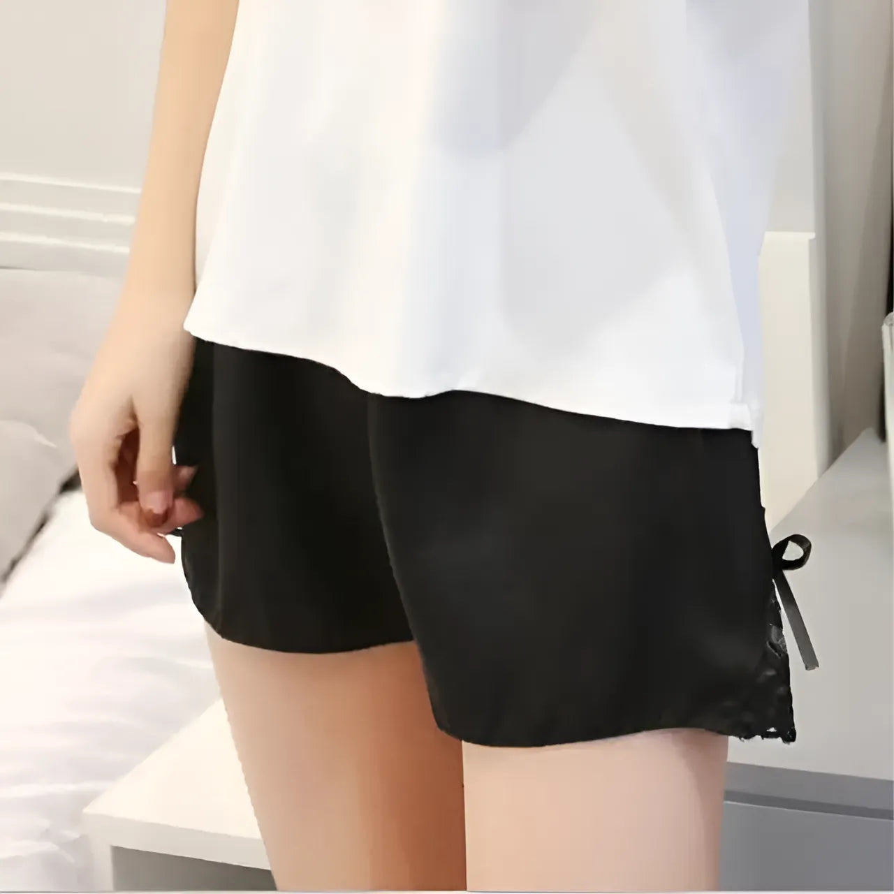 Noir Shorts en satin avec taille élastique