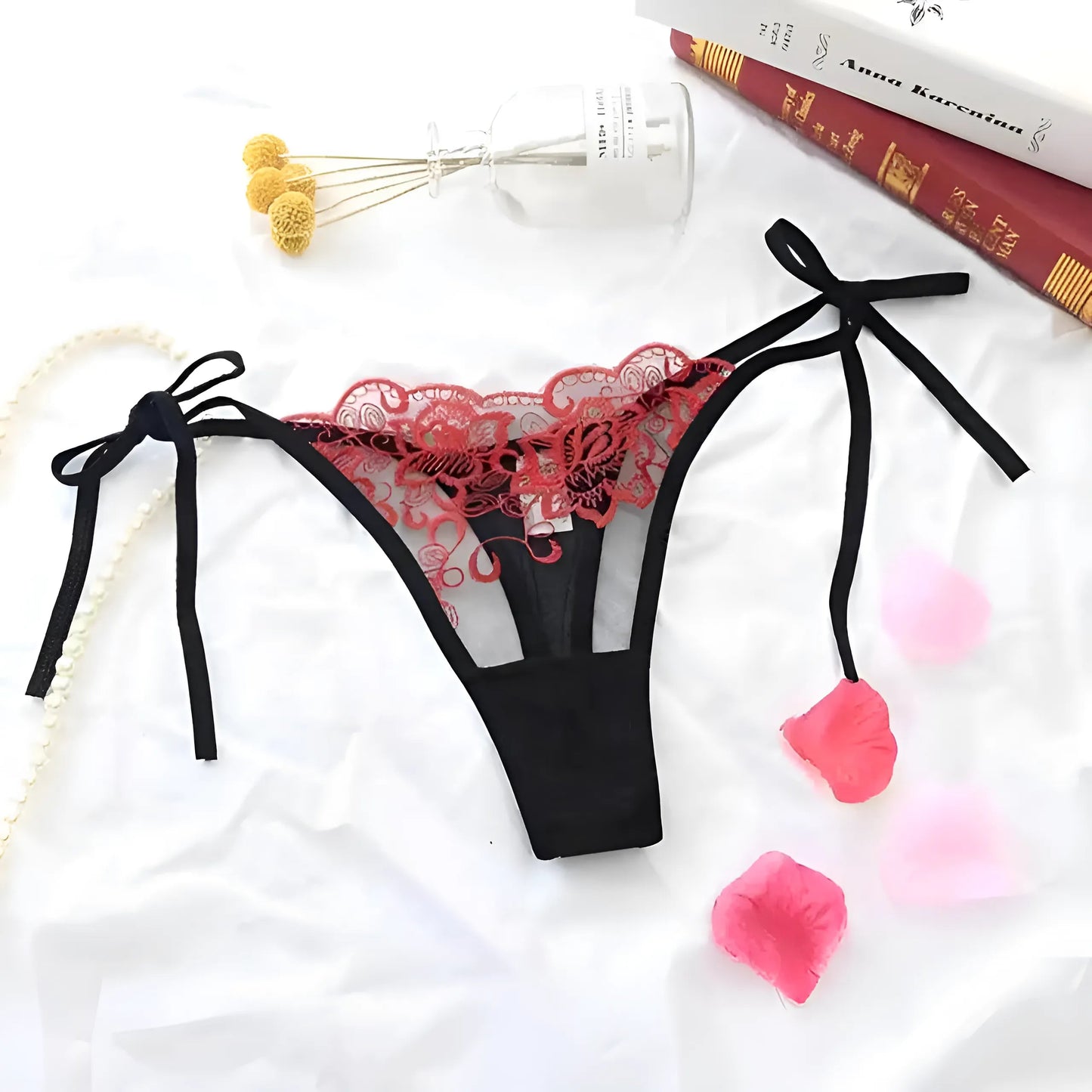 Rouge String en dentelle avec liens à la taille
