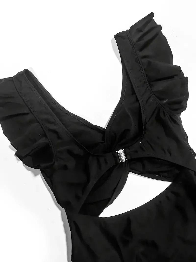 Maillot une pièce noir gainant à résille contrastée