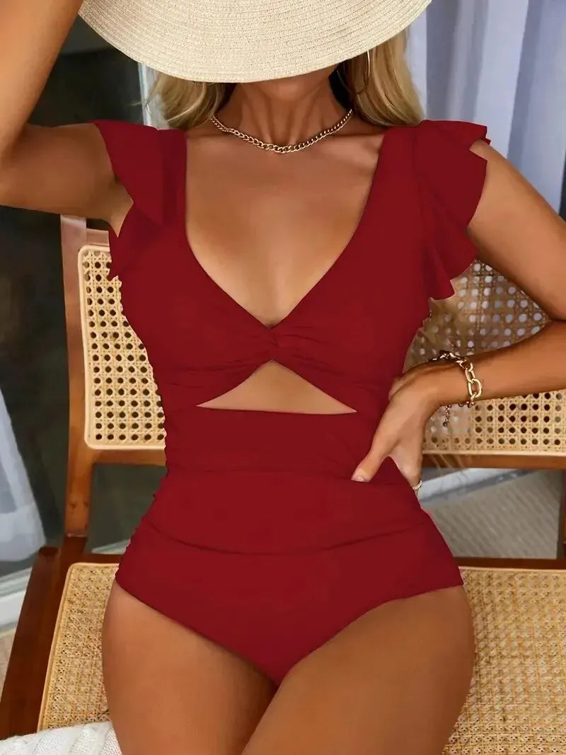 Maillot une pièce noir gainant à résille contrastée