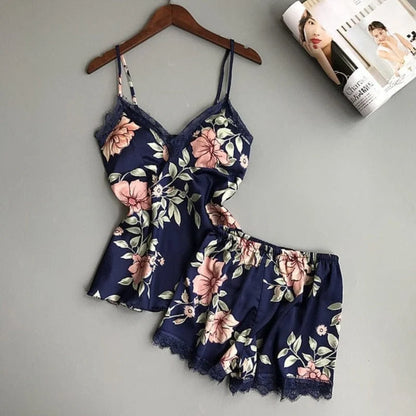 Pyjama avec un haut et un short avec des fleurs - bleu marine / s