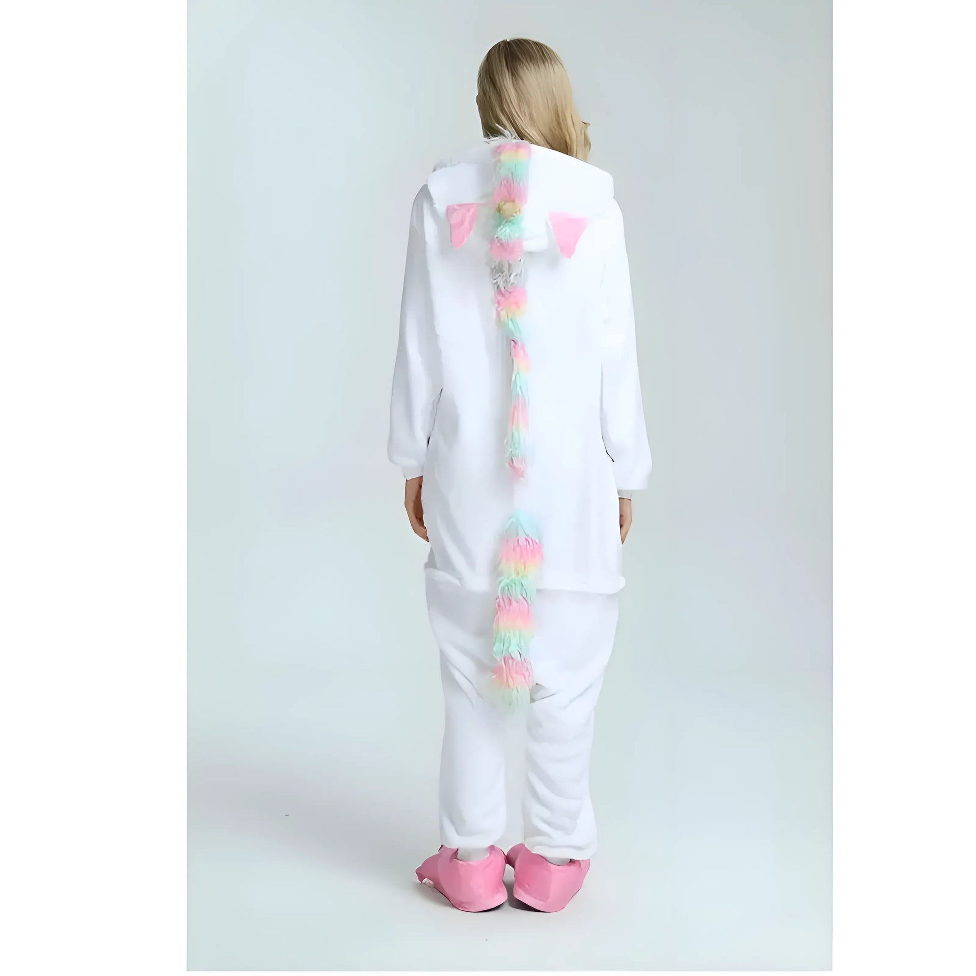  Unicorn Onesie in French is "Combinaison licorne".